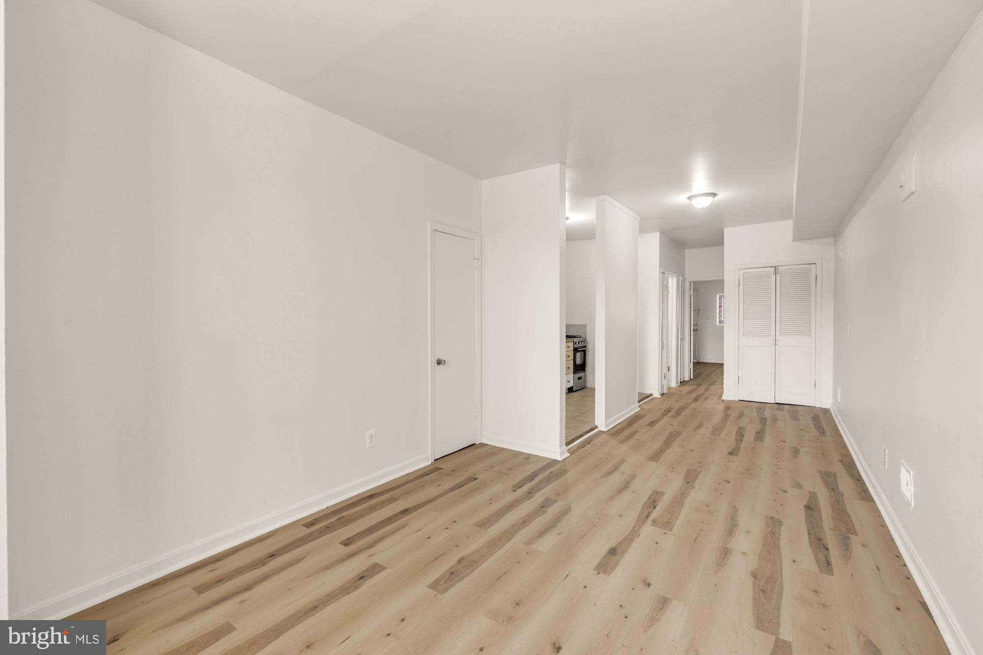 1102 K Street Southeast Washington, DC 20003 - Photo 20 of 30 a view of a room with wooden floor