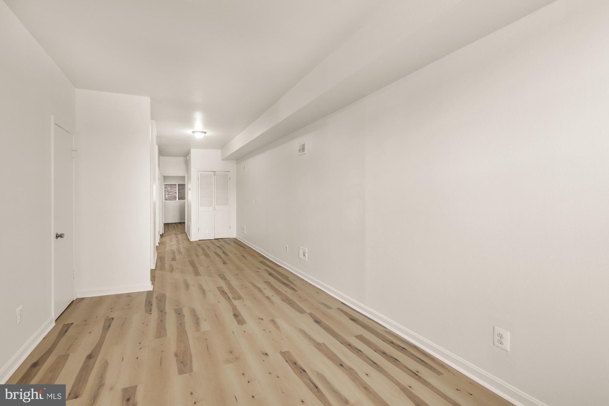 1102 K Street Southeast Washington, DC 20003 - Photo 30 of 30 a view of empty room with wooden floor