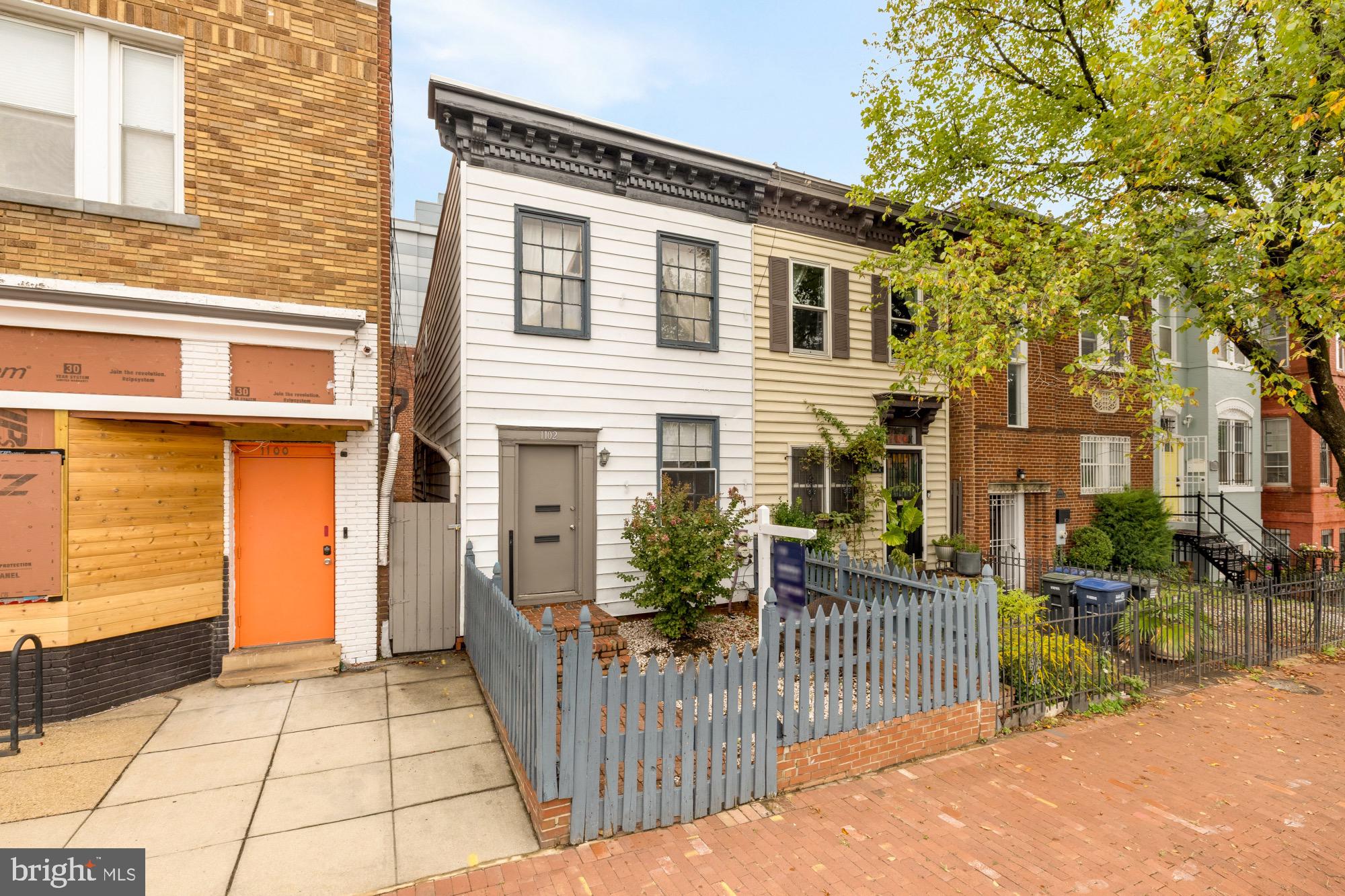 1102 K Street Southeast Washington, DC 20003 - Photo 5 of 30 a view of a house with wooden fence