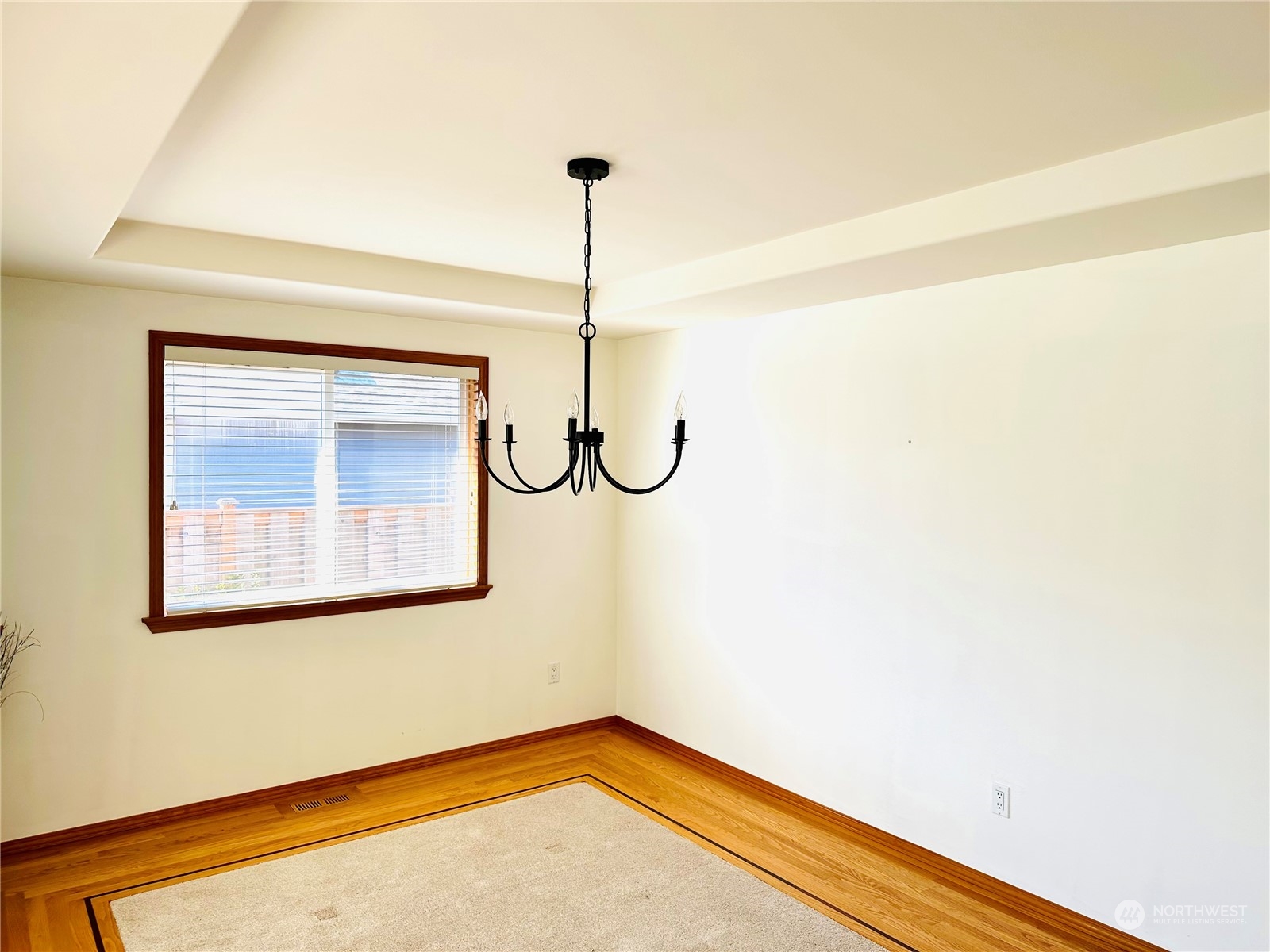 8625 Myrtle Road Northwest Stanwood, WA 98292 - Photo 5 of 23 a view of a room with a window and a potted plant on a wall