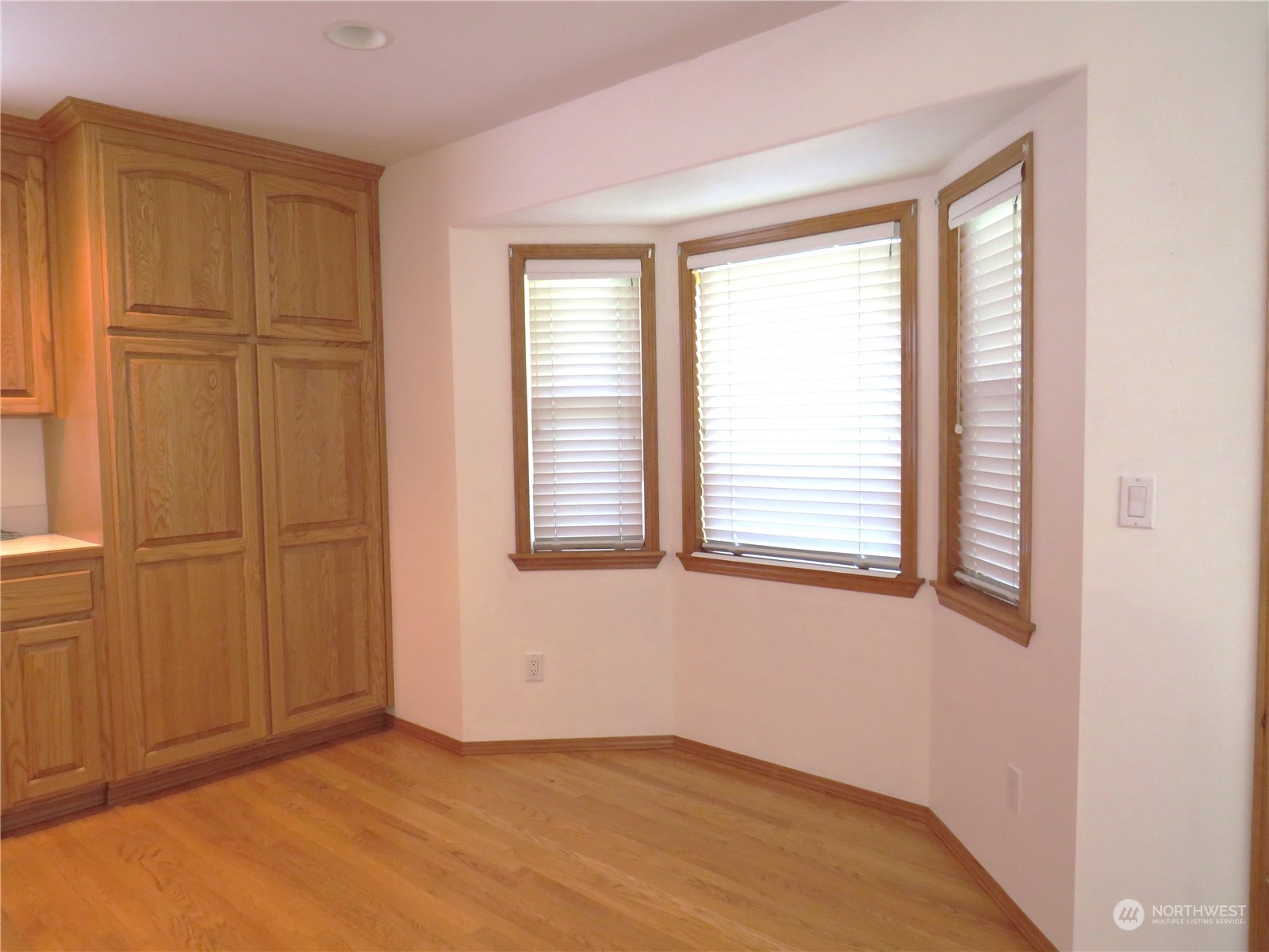 8625 Myrtle Road Northwest Stanwood, WA 98292 - Photo 7 of 23 a view of an empty room with a window