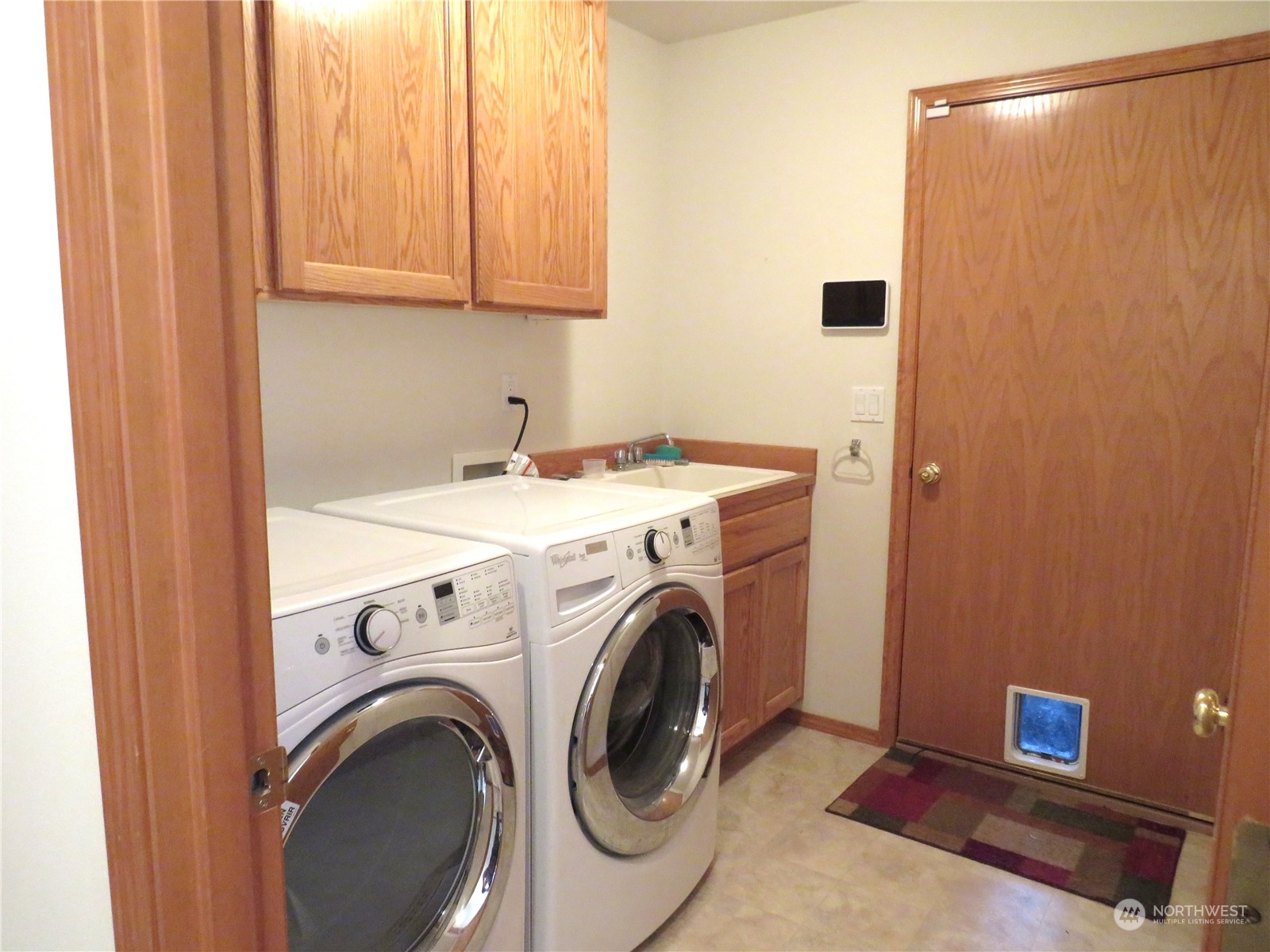8625 Myrtle Road Northwest Stanwood, WA 98292 - Photo 10 of 23 a utility room with dryer and washer