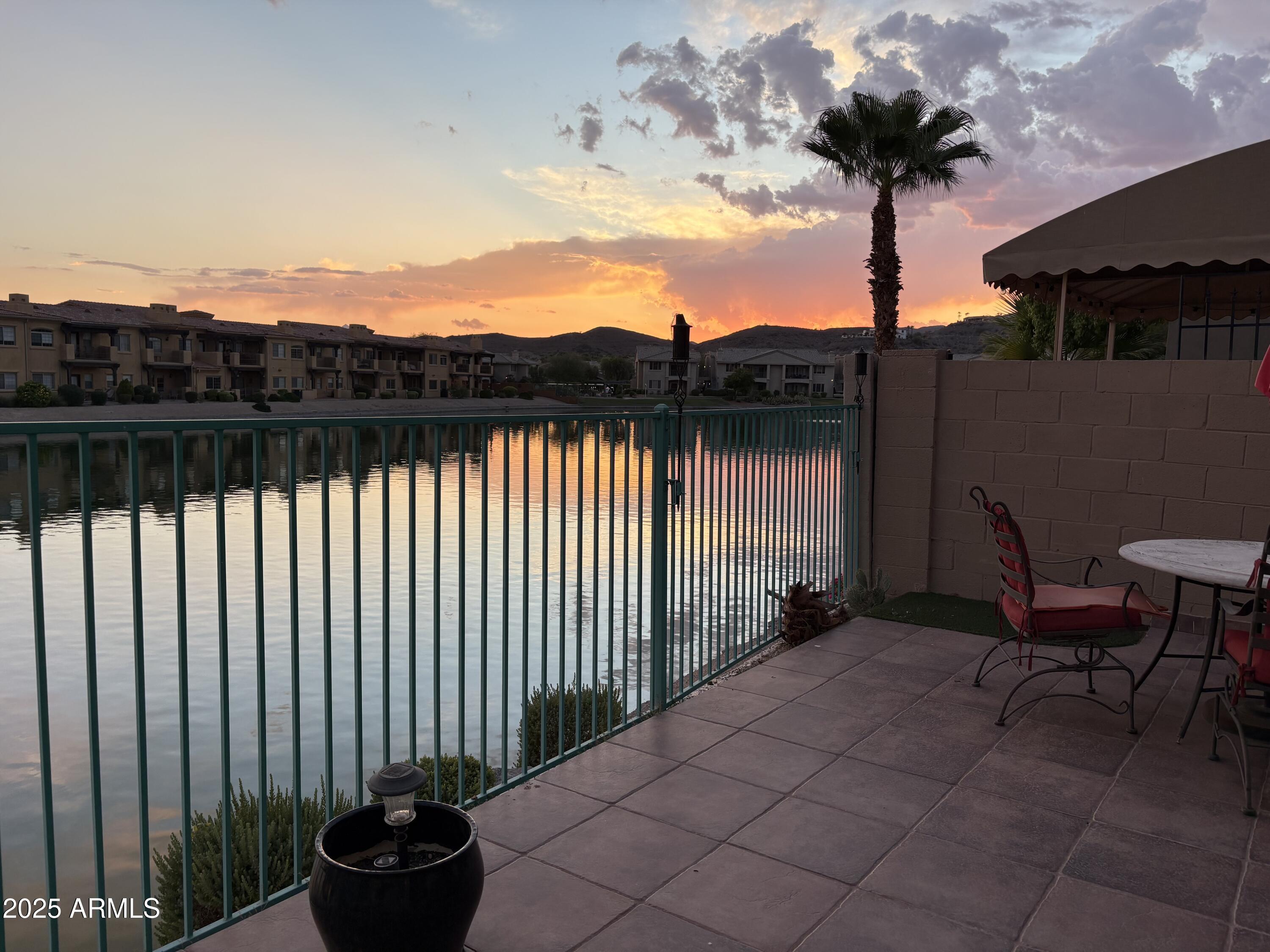 1139 East Frye Road Phoenix, AZ 85048 - Photo 11 of 17 a view of a terrace with a chair and a potted plant