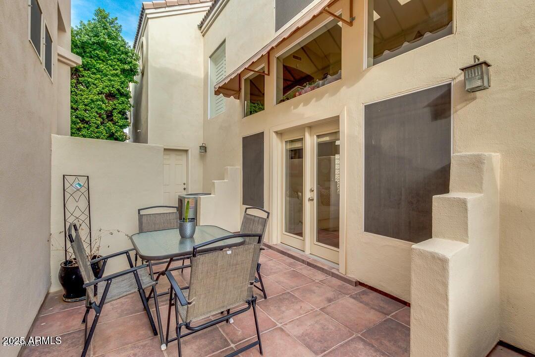 1139 East Frye Road Phoenix, AZ 85048 - Photo 14 of 17 a view of a patio with table and chairs