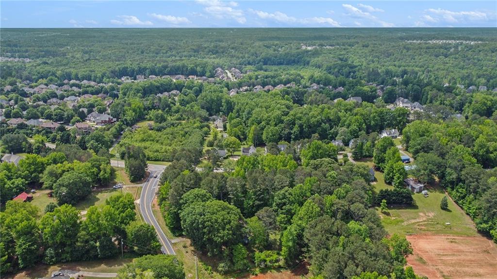 3852 Drew Campground Road Cumming, GA 30040 - Photo 12 of 41 an aerial view of a house with a yard