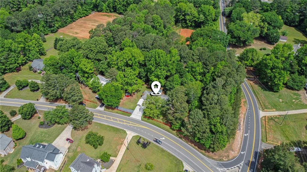 3852 Drew Campground Road Cumming, GA 30040 - Photo 15 of 41 an aerial view of a house with a yard