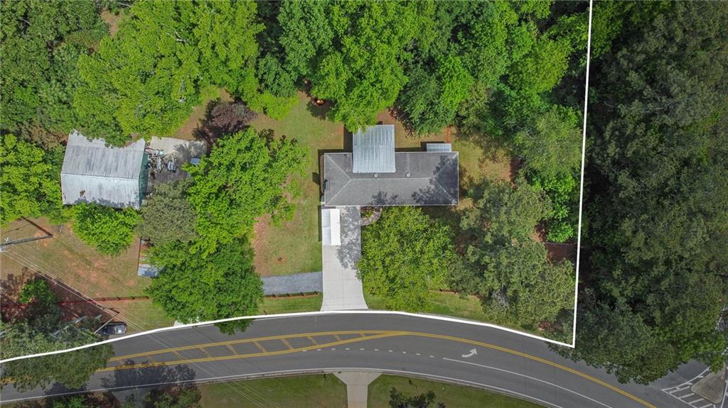 3852 Drew Campground Road Cumming, GA 30040 - Photo 16 of 41 an aerial view of a house