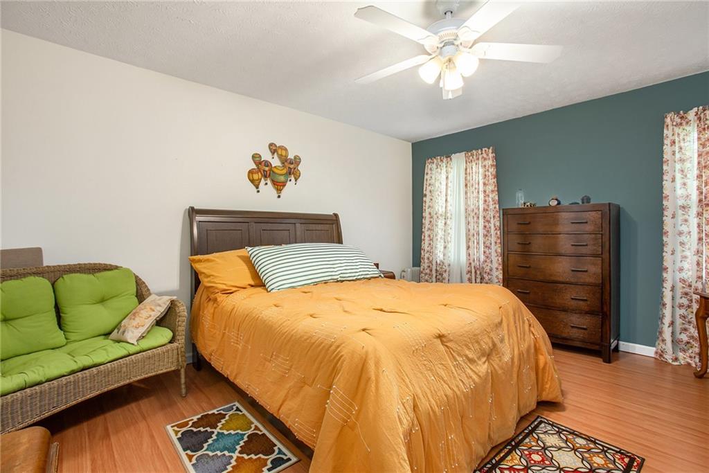 3852 Drew Campground Road Cumming, GA 30040 - Photo 29 of 41 a bedroom with a bed and window