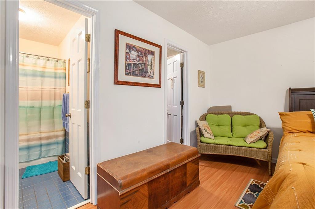 3852 Drew Campground Road Cumming, GA 30040 - Photo 30 of 41 a living room with furniture and a window