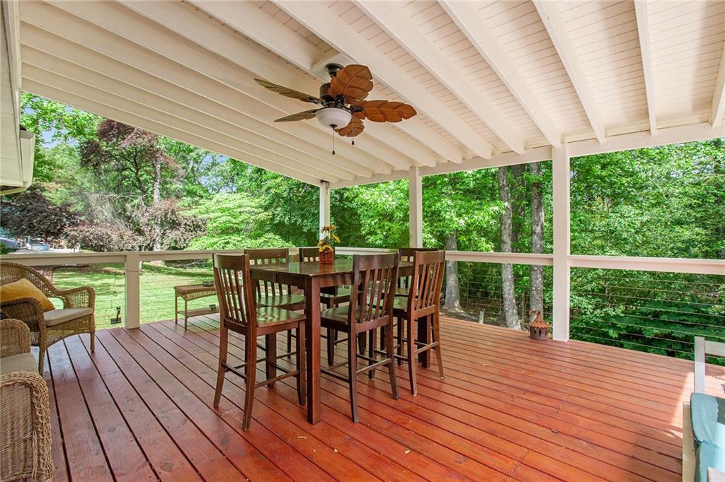 3852 Drew Campground Road Cumming, GA 30040 - Photo 36 of 41 a view of a patio with a table chairs and backyard