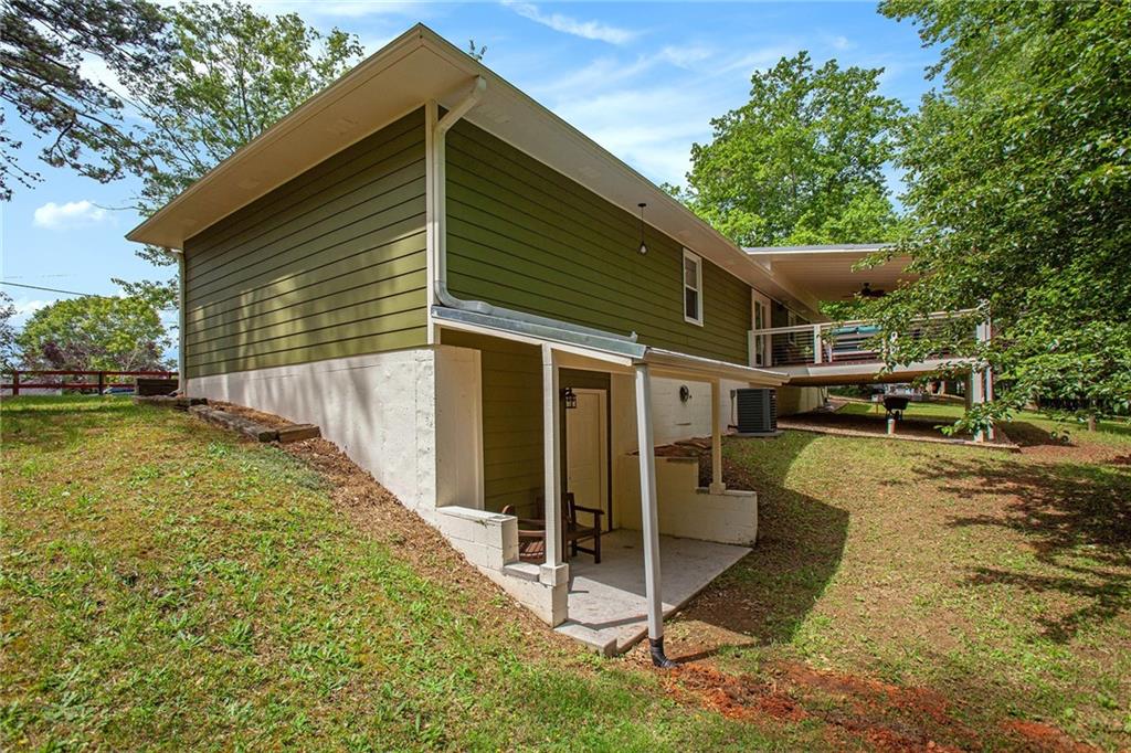 3852 Drew Campground Road Cumming, GA 30040 - Photo 39 of 41 a view of house with backyard