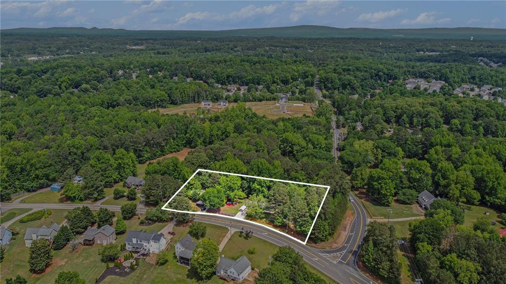 3852 Drew Campground Road Cumming, GA 30040 - Photo 4 of 41 a view of a wooden bridge