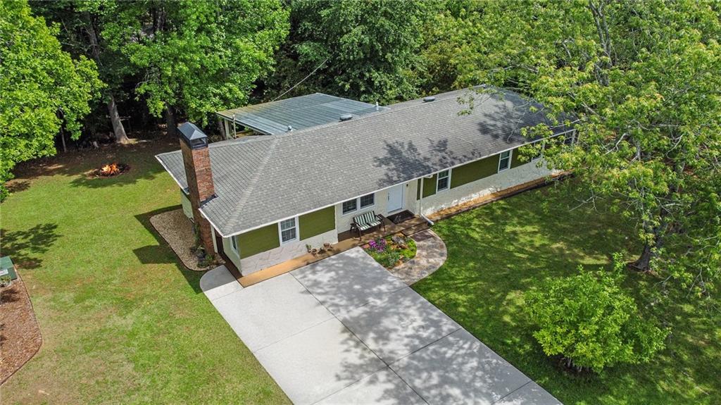 3852 Drew Campground Road Cumming, GA 30040 - Photo 7 of 41 a view of a house with a yard