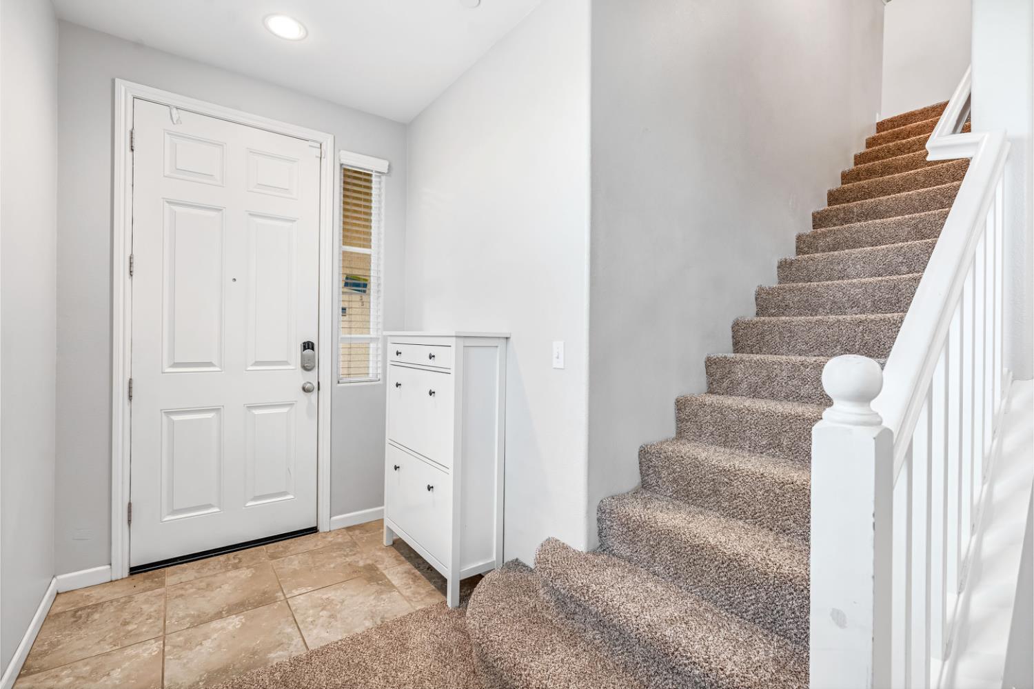 1503 North Reunion Way Clovis, CA 93619 - Photo 12 of 25 a view of an entryway with staircase