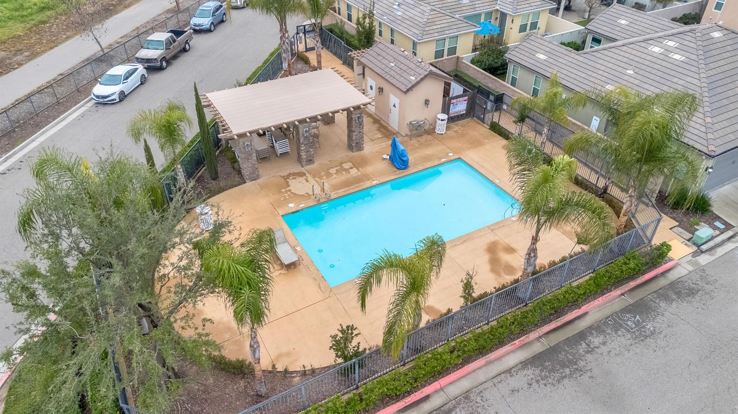 1503 North Reunion Way Clovis, CA 93619 - Photo 20 of 25 an aerial view of a house a yard and lake view