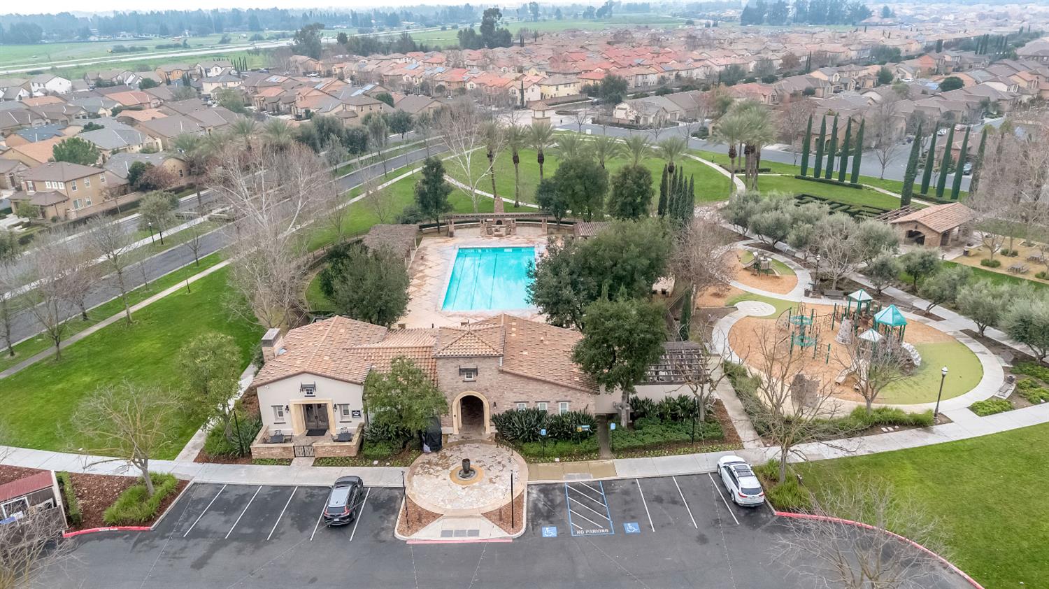 1503 North Reunion Way Clovis, CA 93619 - Photo 23 of 25 an aerial view of a house with a yard and lake view