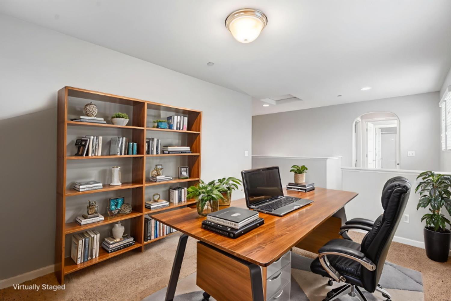 1503 North Reunion Way Clovis, CA 93619 - Photo 4 of 25 a view of a workspace with furniture and a bookshelf