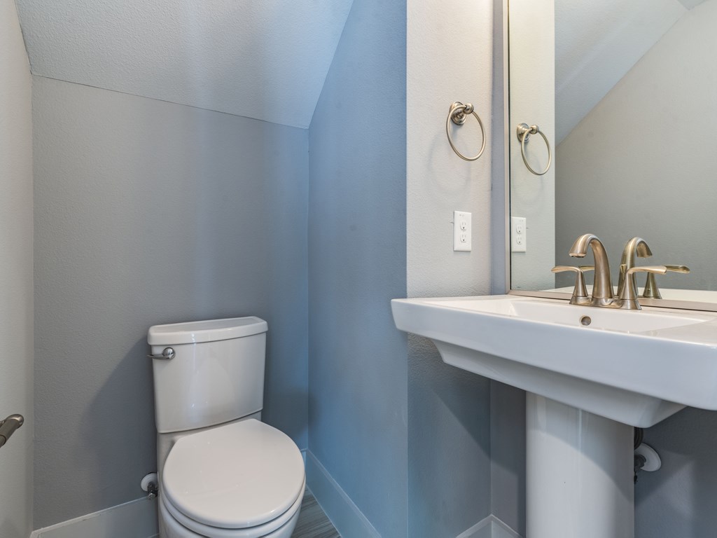 406 Post Rd Drive, Unit 1 Austin, TX 78704 - Photo 12 of 30 Powder room bath with modern Pedi stool sink