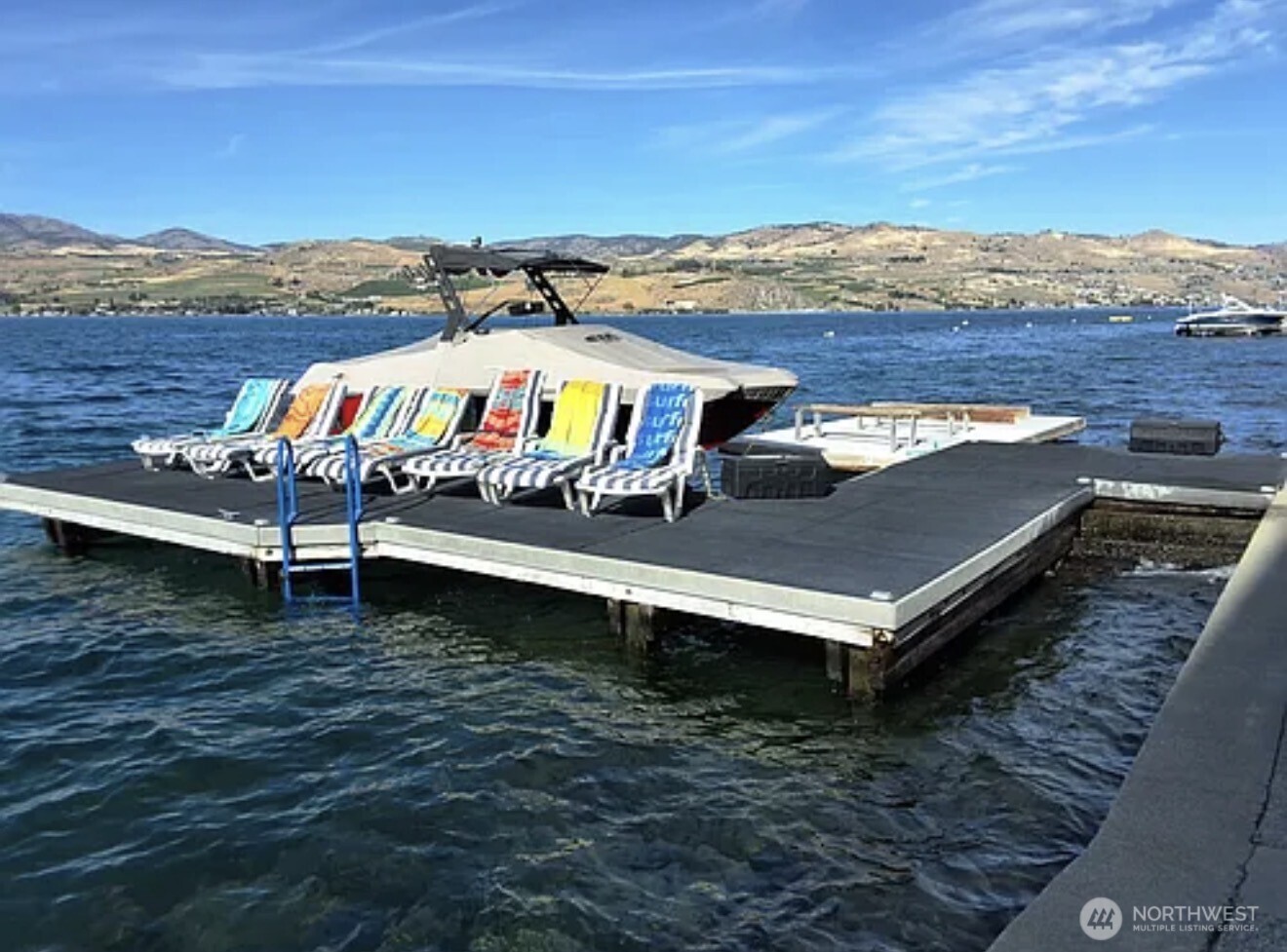 2685 South Lakeshore Road Chelan, WA 98816 - Photo 14 of 16 a view of a terrace with a ocean view