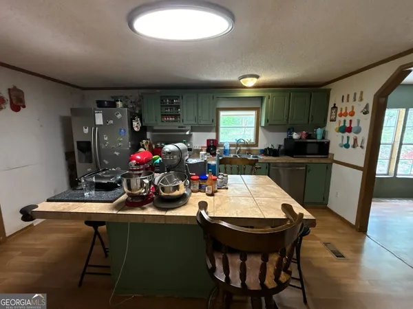 a view of a dining room with furniture