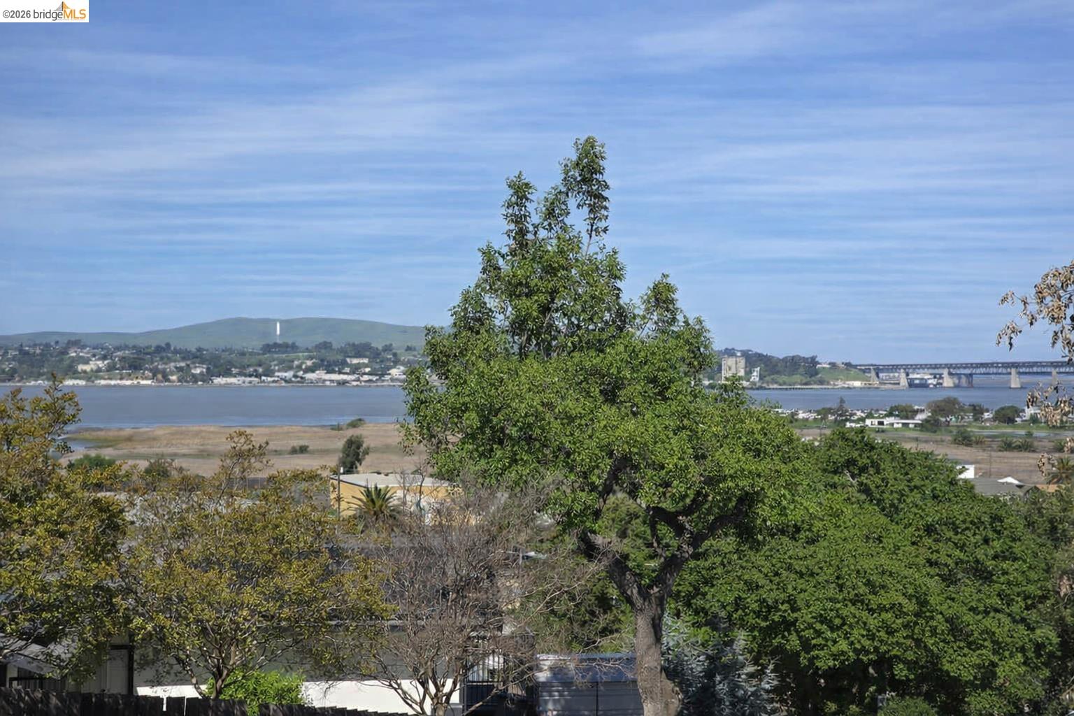 40 Foster Street Martinez, CA 94553 - Photo 3 of 4 a view of a lake with a building in the background