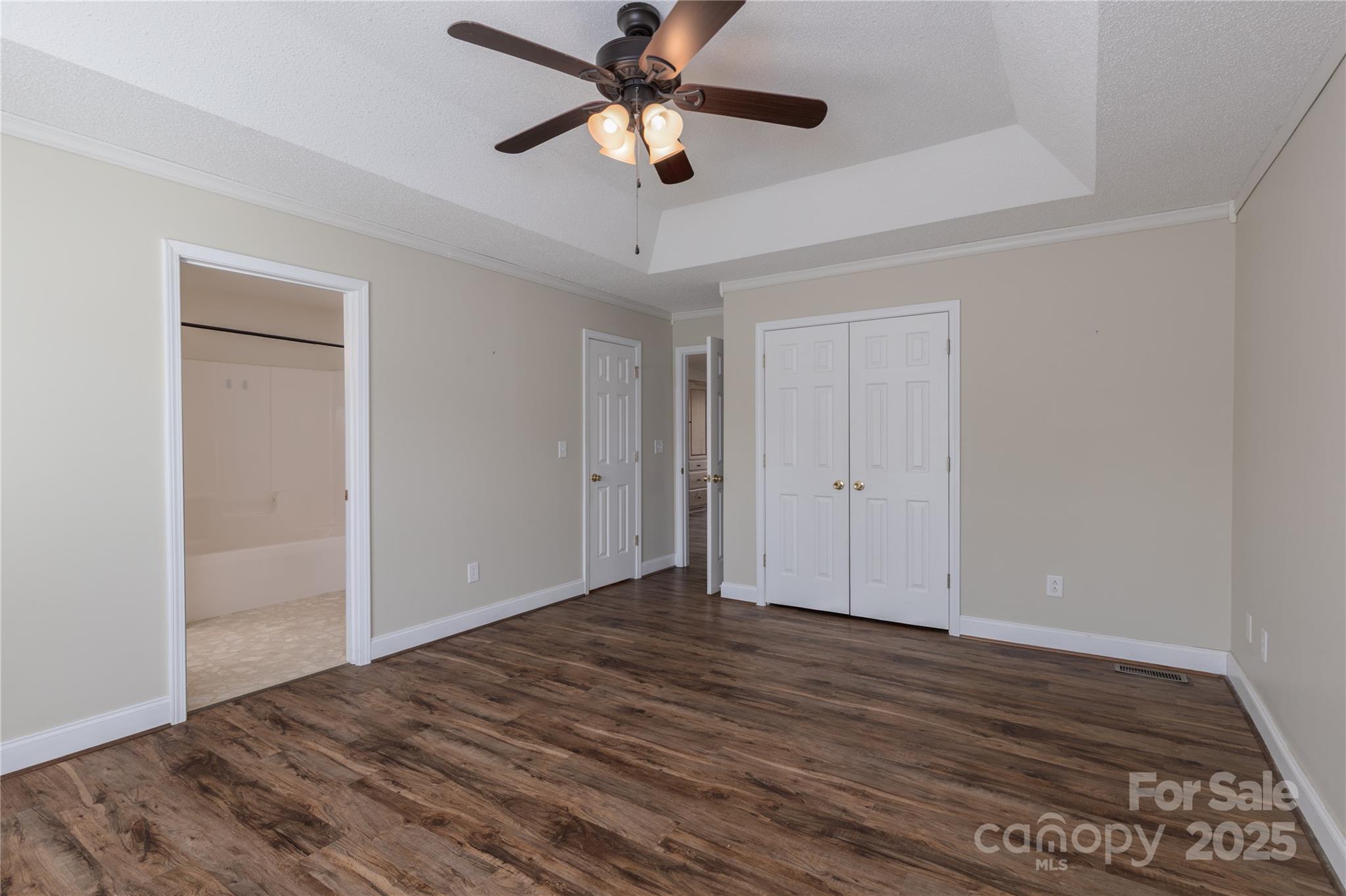 1505 Moss Springs Road Albemarle, NC 28001 - Photo 9 of 26 a view of an empty room with wooden floor