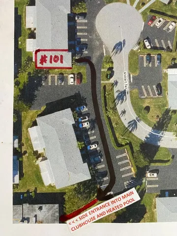 an aerial view of a residential apartment building with entryway