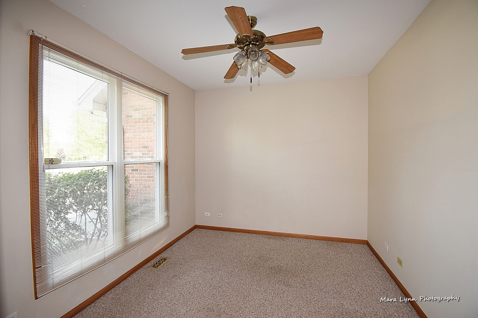 548 Lewis Road Geneva, IL 60134 - Photo 11 of 47 a view of room with window and a ceiling fan