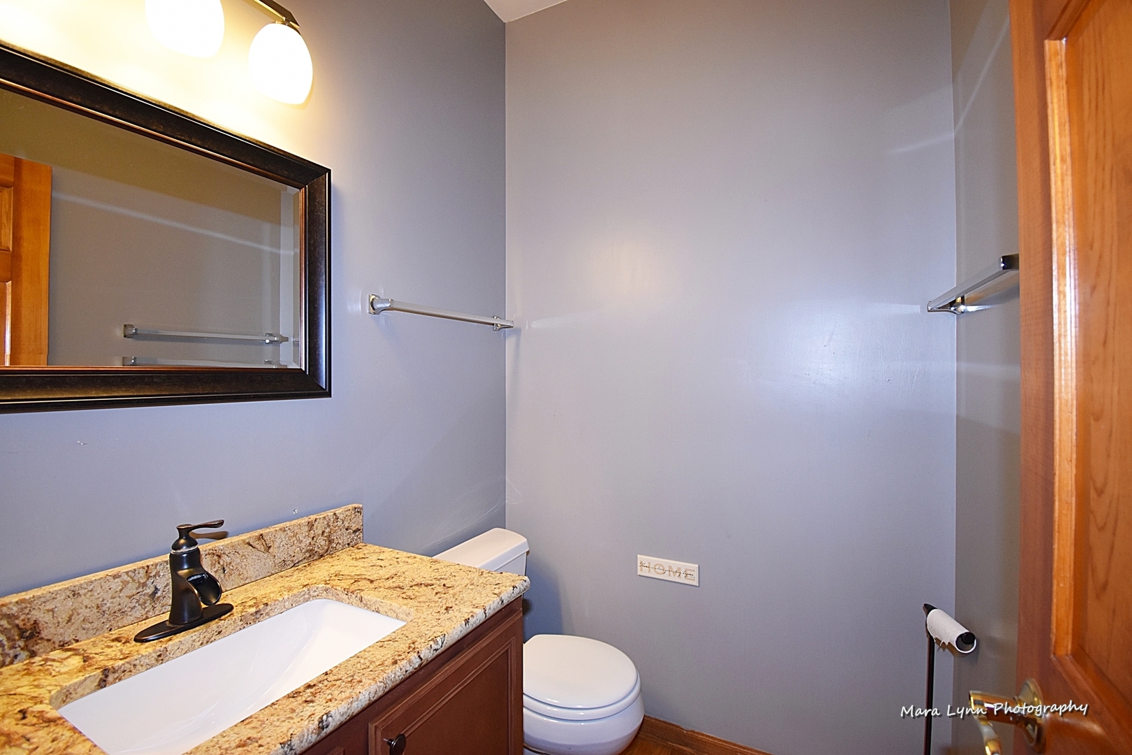 548 Lewis Road Geneva, IL 60134 - Photo 20 of 47 a bathroom with a granite countertop sink mirror vanity and toilet