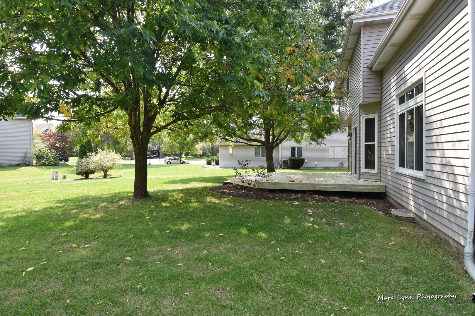 548 Lewis Road Geneva, IL 60134 - Photo 41 of 47 a view of a house with a yard