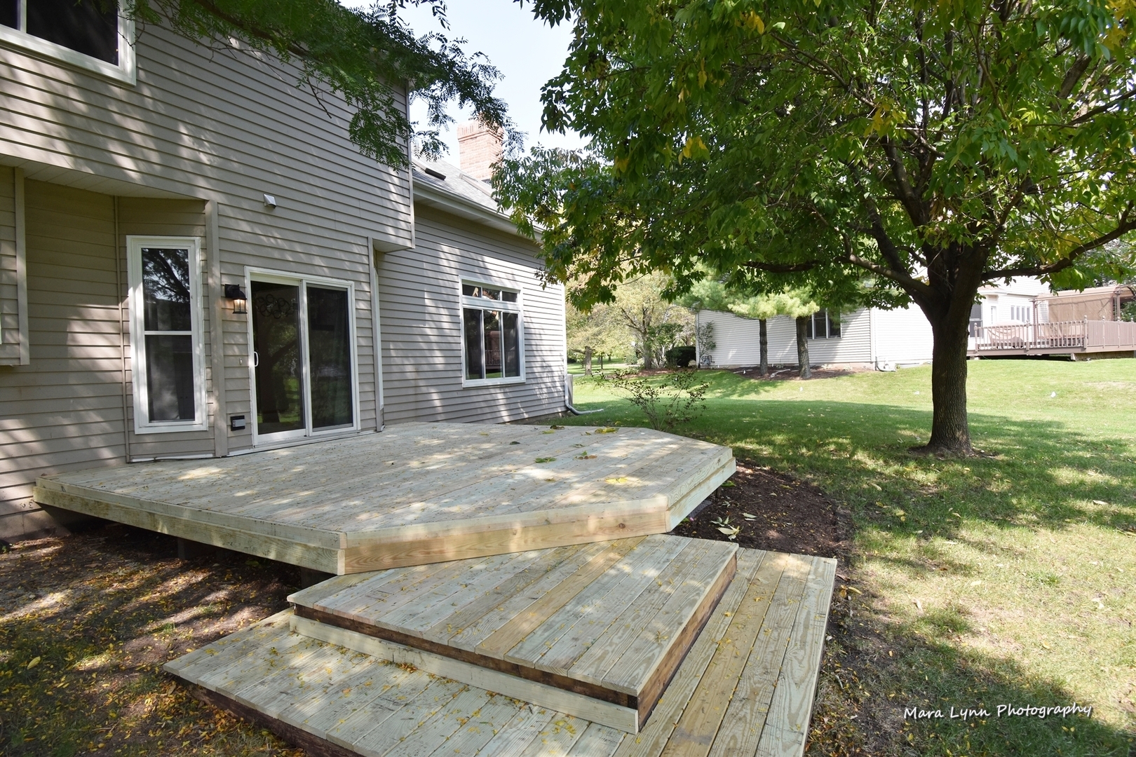 548 Lewis Road Geneva, IL 60134 - Photo 45 of 47 a view of a backyard with large trees