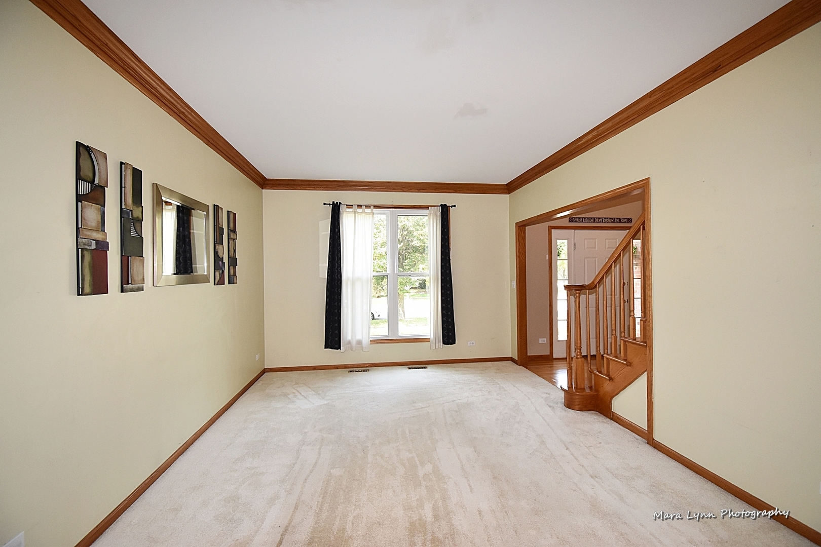 548 Lewis Road Geneva, IL 60134 - Photo 8 of 47 a view of an empty room with a window
