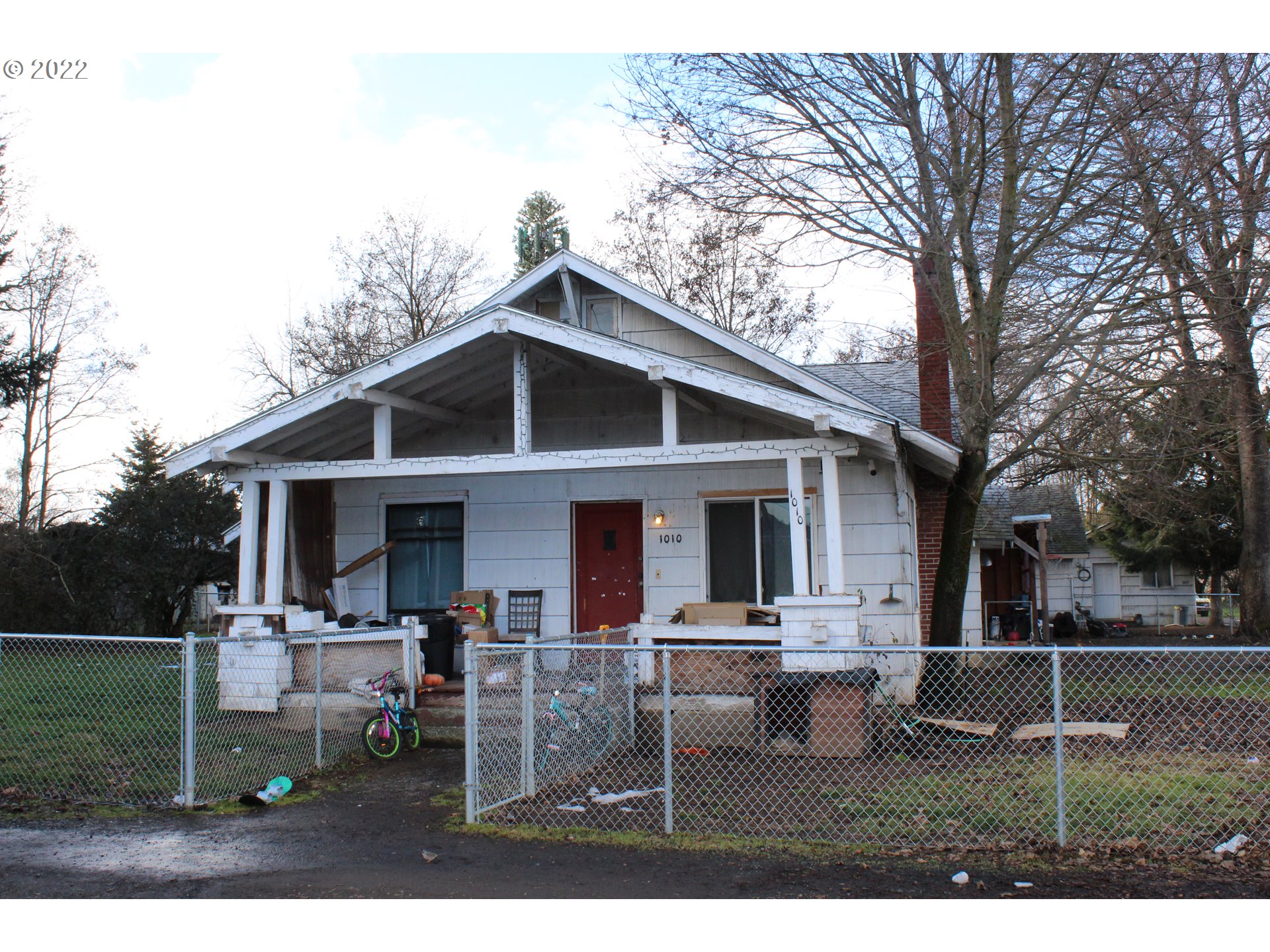 1010 Tucker Road Hood River, OR 97031 - Photo 1 of 1 a view of a house with backyard porch and sitting area