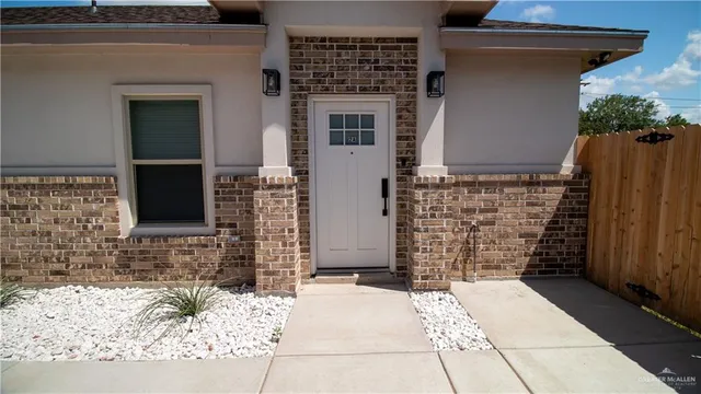 a front view of a house with an outdoor space