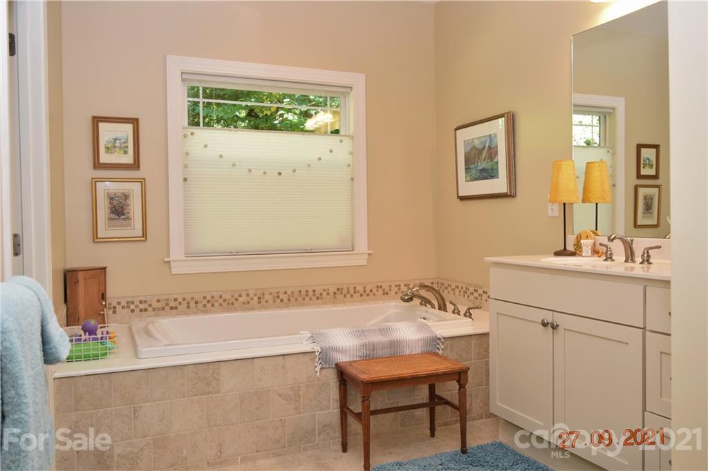 160 Kent Road Salisbury, NC 28147 - Photo 17 of 27 a bathroom with a sink and a mirror