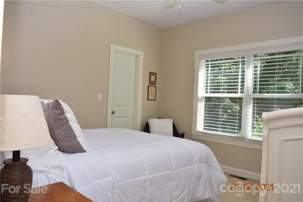 160 Kent Road Salisbury, NC 28147 - Photo 20 of 27 a bedroom with a bed and a large window
