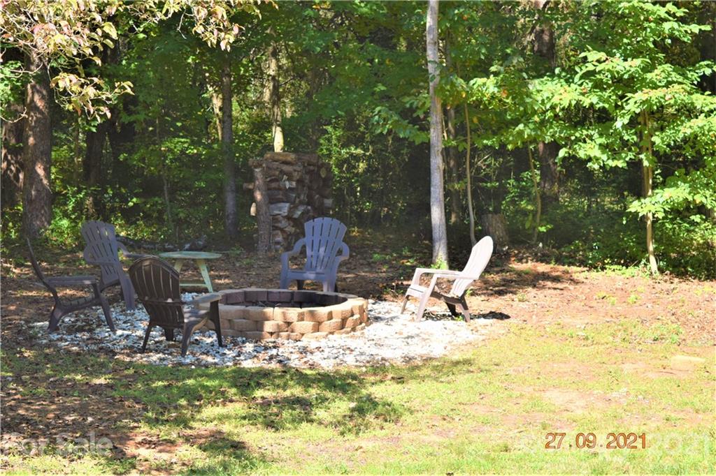 160 Kent Road Salisbury, NC 28147 - Photo 24 of 27 a view of a backyard with sitting area