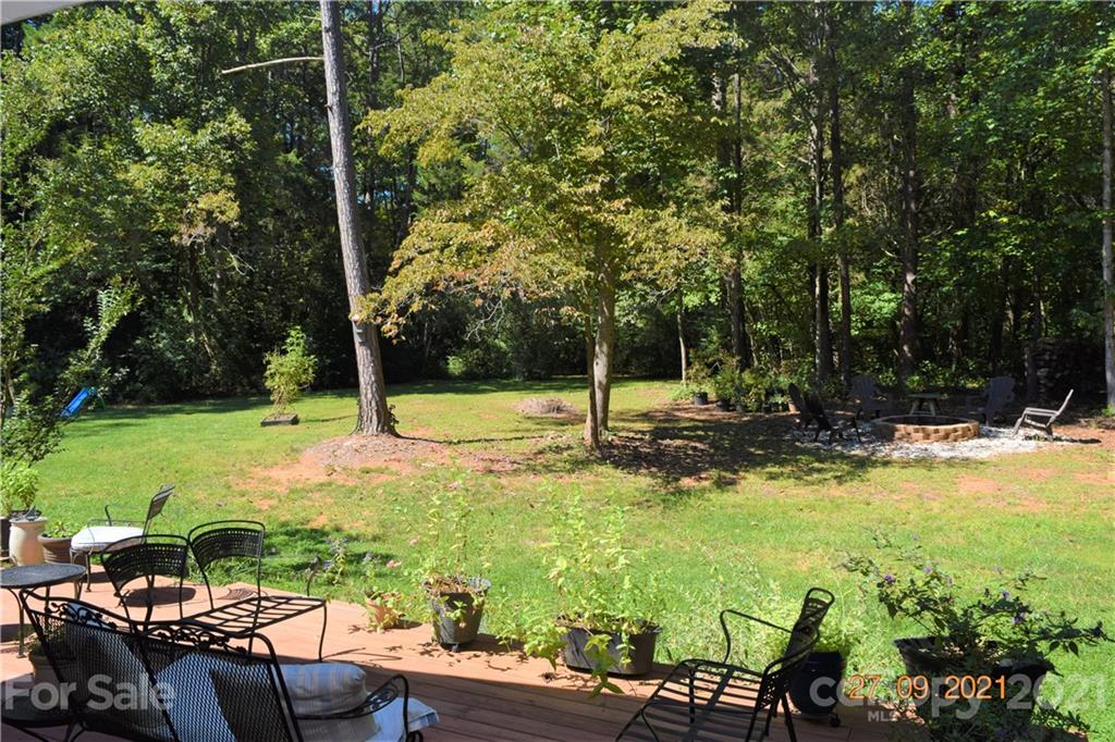 160 Kent Road Salisbury, NC 28147 - Photo 27 of 27 a view of a garden with lawn chairs