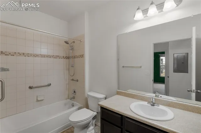 a view of storage and utility room with washer and dryer