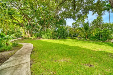 a view of a golf course with a park