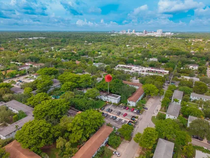 a view of city and green space