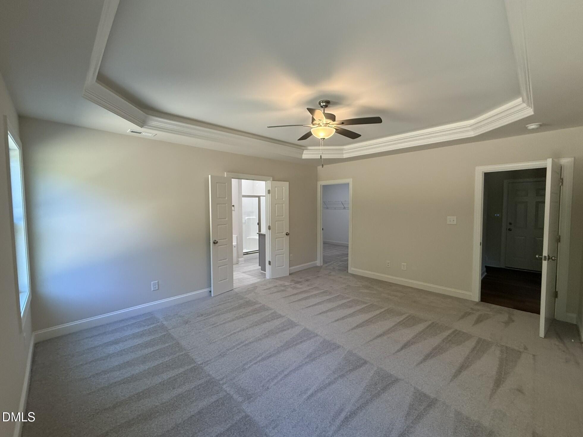 309 Busterfield Court Benson, NC 27504 - Photo 13 of 27 wooden floor in an empty room with a window