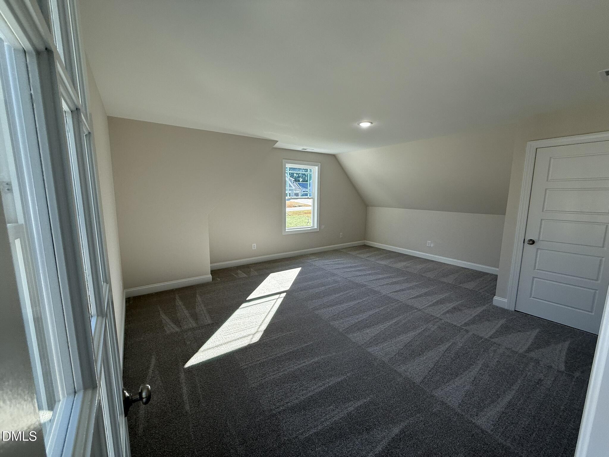 309 Busterfield Court Benson, NC 27504 - Photo 21 of 27 a view of empty room with wooden floor