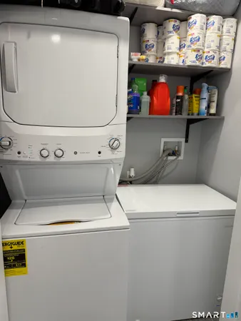a utility room with washer and dryer
