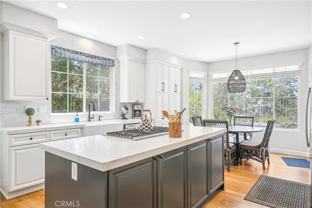 a bathroom with a toilet a sink and a mirror