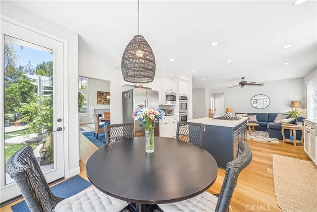 a bedroom with a bed and ceiling fan