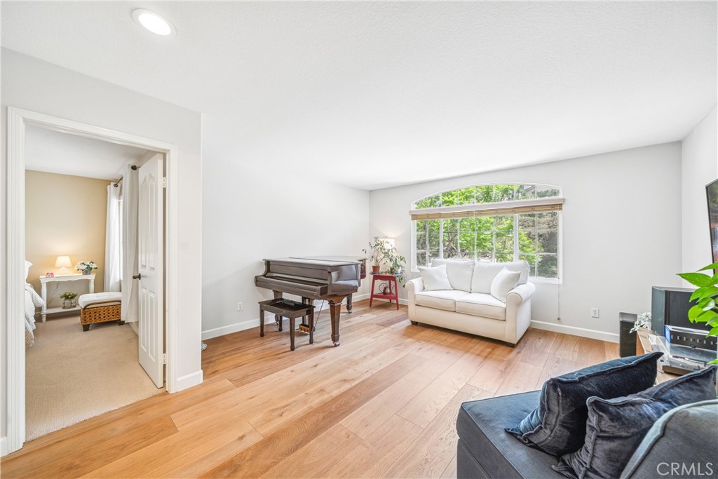 22681 Maplewood Mission Viejo, CA 92692 - Photo 31 of 71 a living room with furniture and a wooden floor