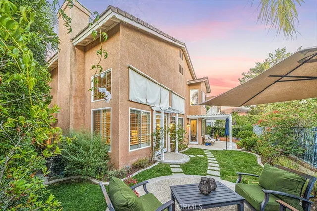 a view of a park with swings and slides