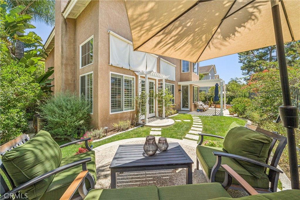 22681 Maplewood Mission Viejo, CA 92692 - Photo 42 of 71 a view of a patio with couches chairs and potted plants