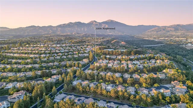 a view of a playground with basketball court